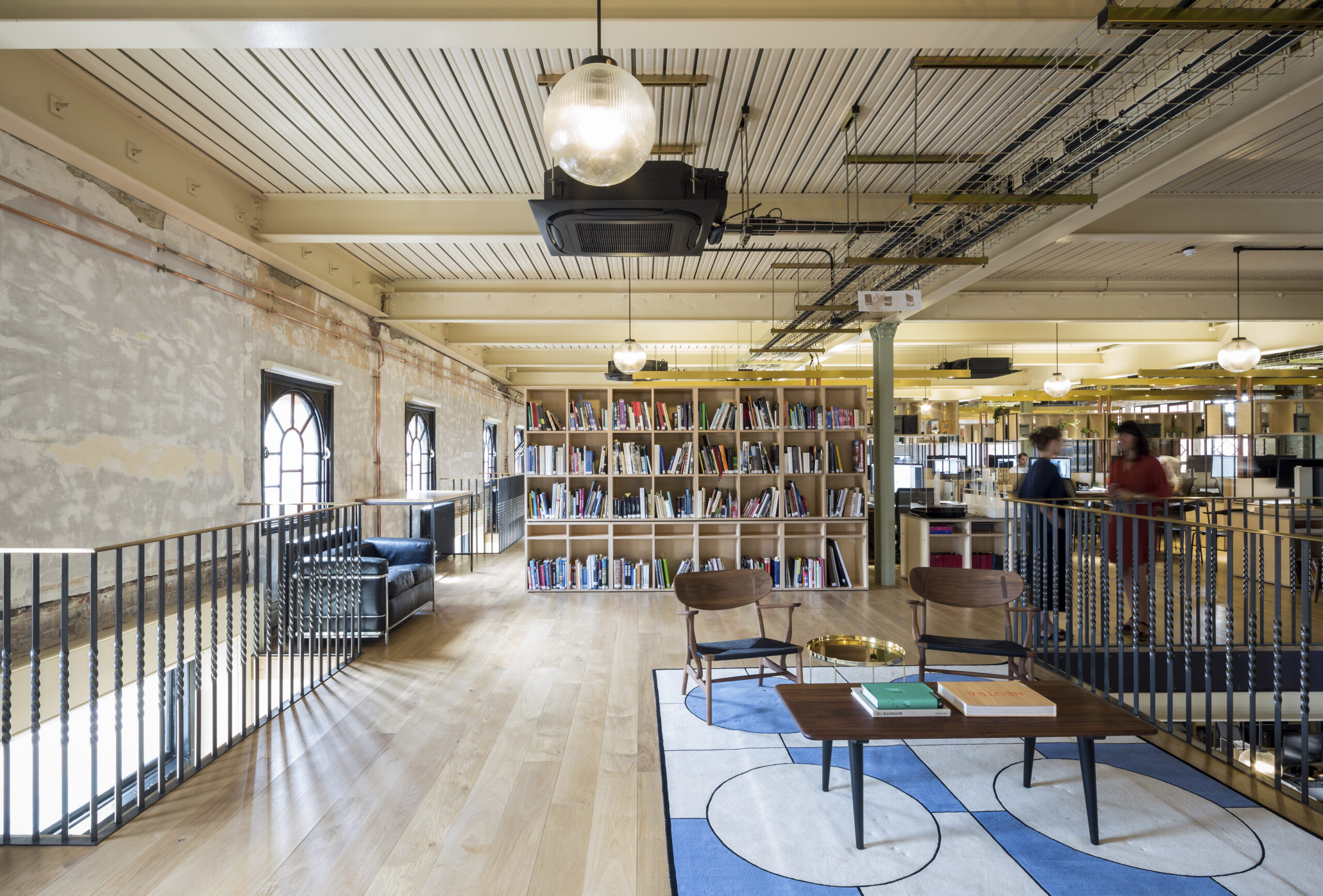 Bright breakout space, with library, in our co-working space.