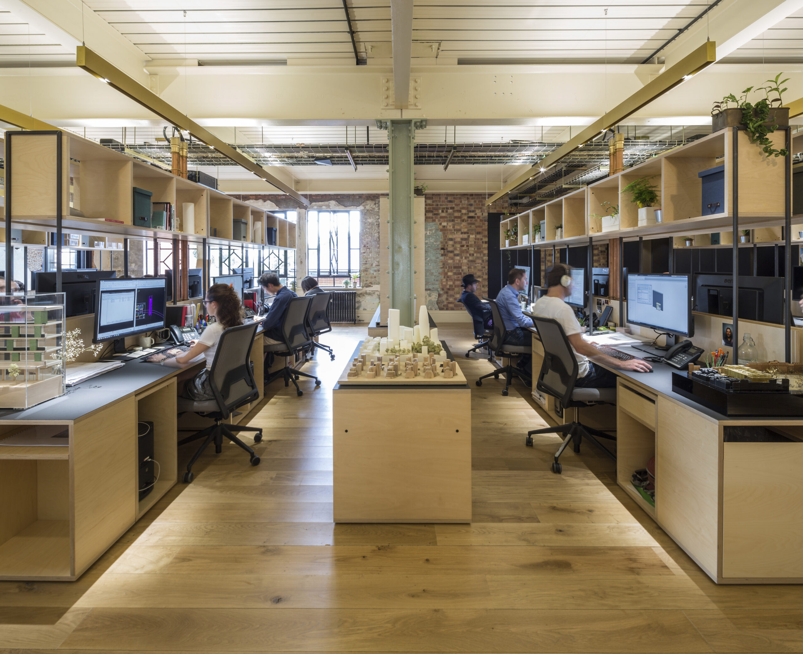 Our dedicated desks are large and come with storage above and below.